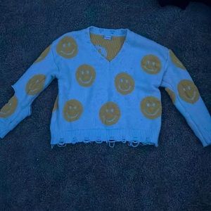 attarid. state yellow smiley face sweater